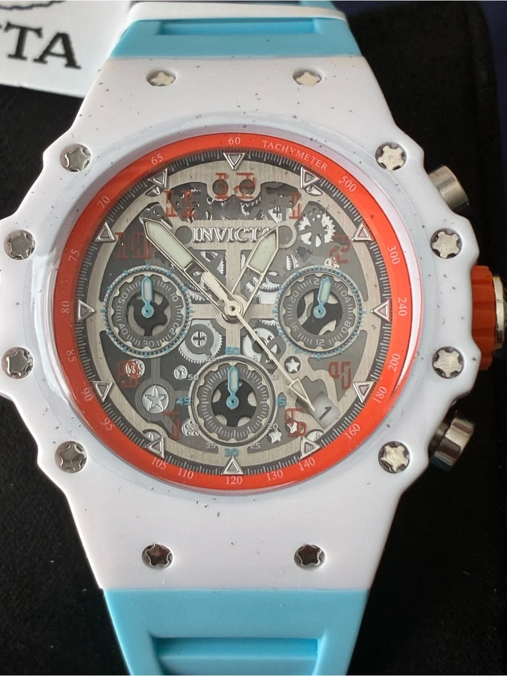 Invicta White Watch with Coral Orange Bezel and Aqua Strap
